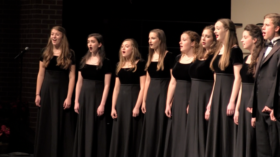 A capella performs at the winter concert in December.