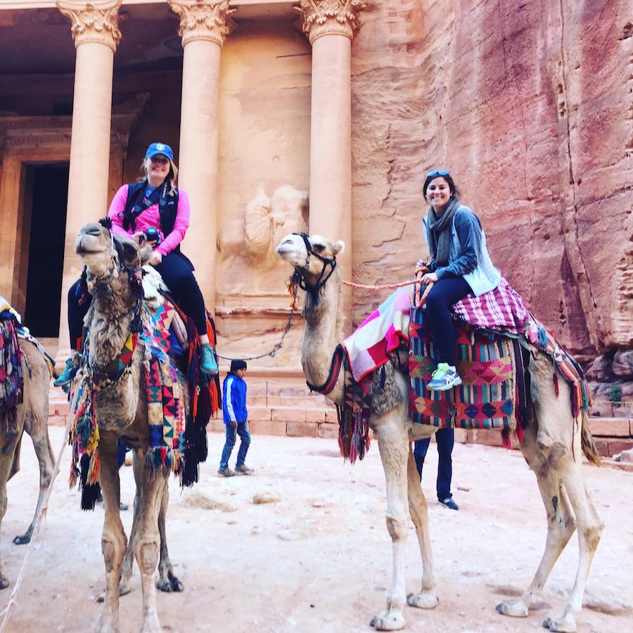 Todd and her church friend, McCarty, riding camels in Petra, Jordan.