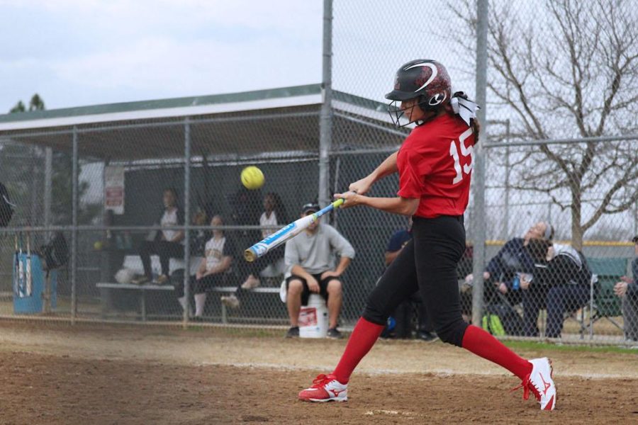 Senior Kylee Ramos connects with a pitch.