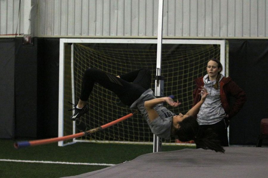 Sophomore Alaina Pierce practices high jump.