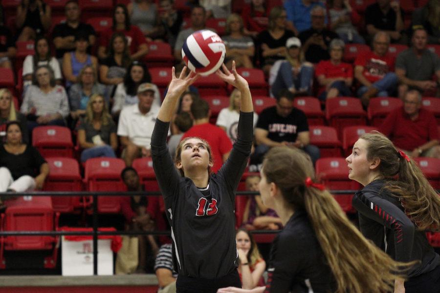 Junior Gracie Sutherland sets the ball to execute a play against Royse City.