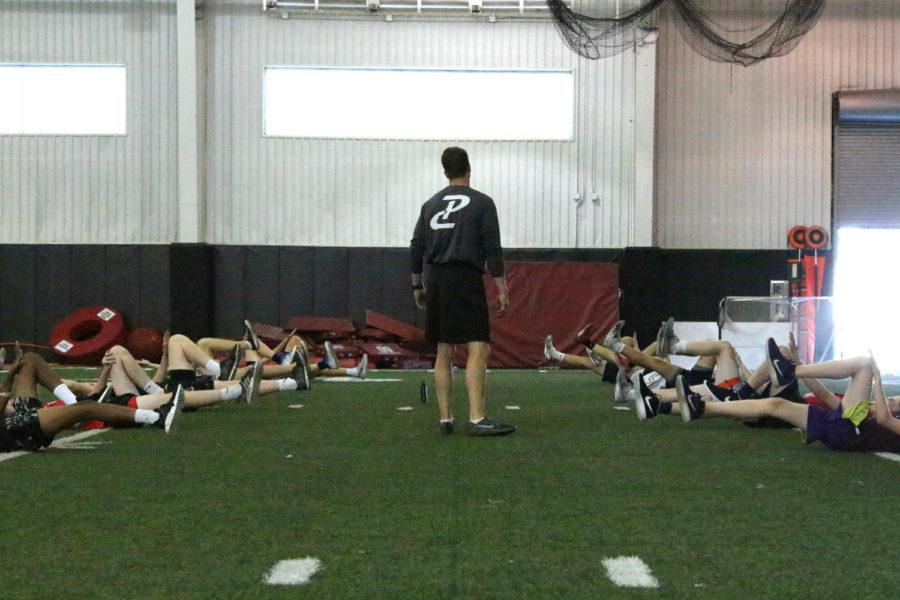 The Performance Course coaches run the athletes through core workouts.