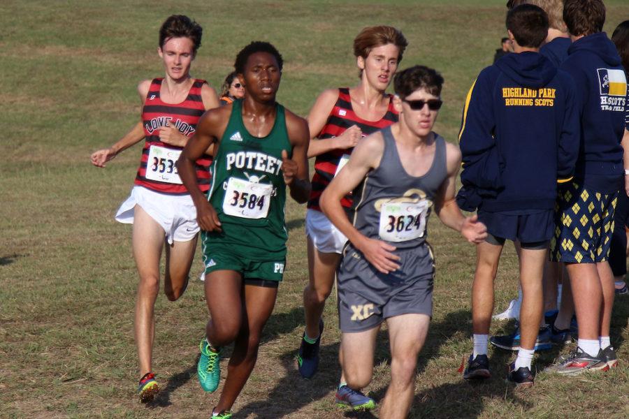 Junior Brett Pederson and Sophomore Brady Laboret come around the bend on the final mile.
