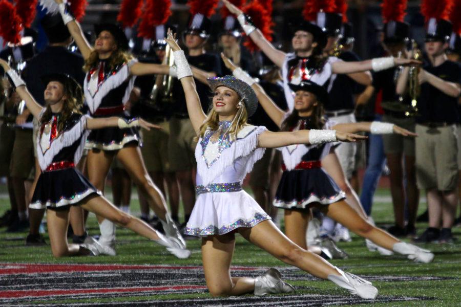 Senior Majestic Major Alyssa Whitmore performs during halftime of the home football game versus Royce City.
