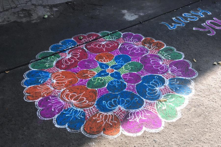 A traditional Indian Kolam, or chalk drawing, adorns the streets of Tiruchirapalli, Tamil Nadu to celebrate the new year. Kolams were used as protections against evil spirits, and colored kolams were used for celebrating special events.