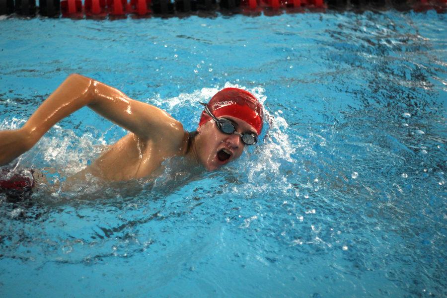 Freshman Max Mueth uses the freestyle to propel forward. Mueth qualified for both the freestyle and backstroke at regionals.