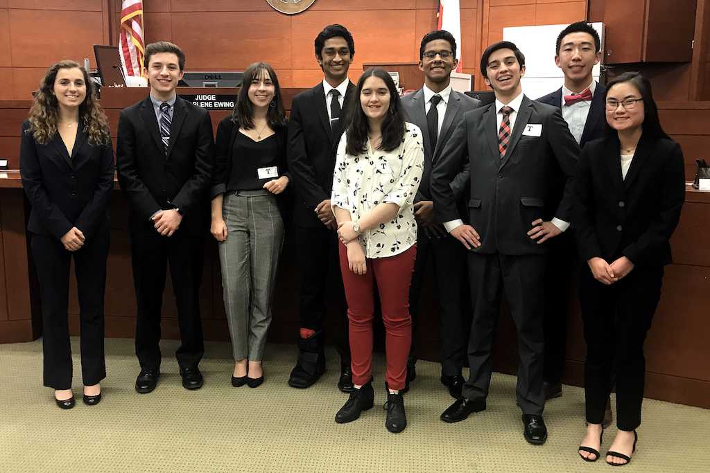 The Mock Trial team poses for picture during the regional finals. Pictured from left to right are Polly Roth, Mikey Franks, Maddie Roth, Nick Dodda, Amelia Flinchbaugh, Abel Thomas, Zach Brown, Brandon Su, and Sydney Wong.