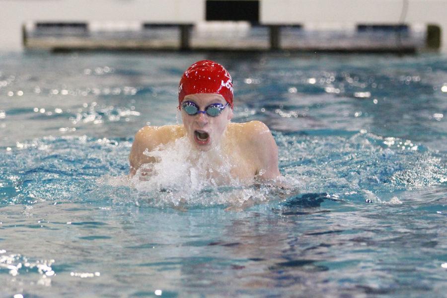Sophomore Jed Jones swims the breaststroke.