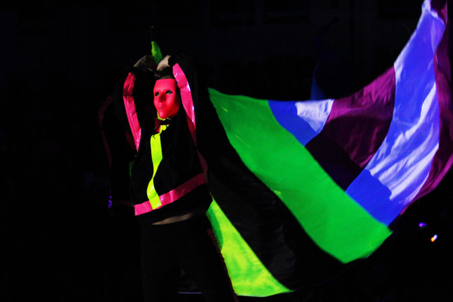 Color Guard incorporated neon duct tape and multicolored flags into their routine.