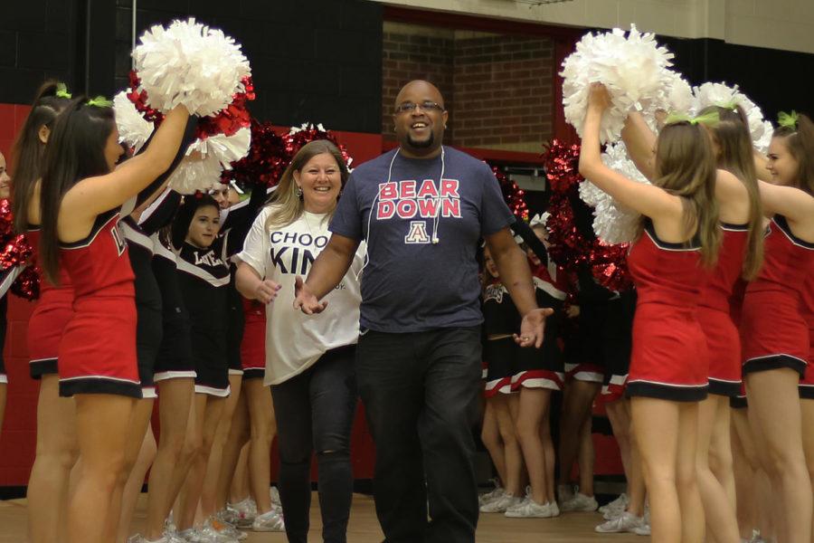 Student Council surprised janitor Andre Givins by honoring him at a pep rally.