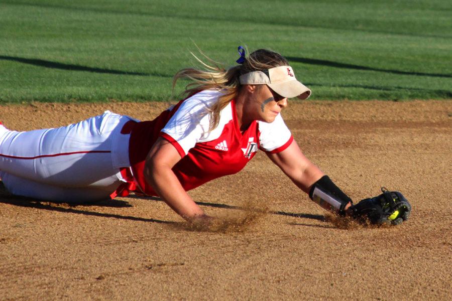 Senior Alyssa Difiore makes a diving play to keep the ball in the infield. 