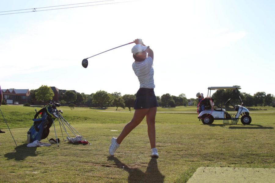 Junior Allie Bianchi tees off in a practice before the state tournament.