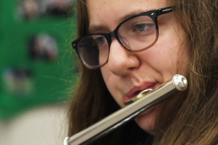 Sophomore Kaileigh Smith practices the flute in preparation for the contest