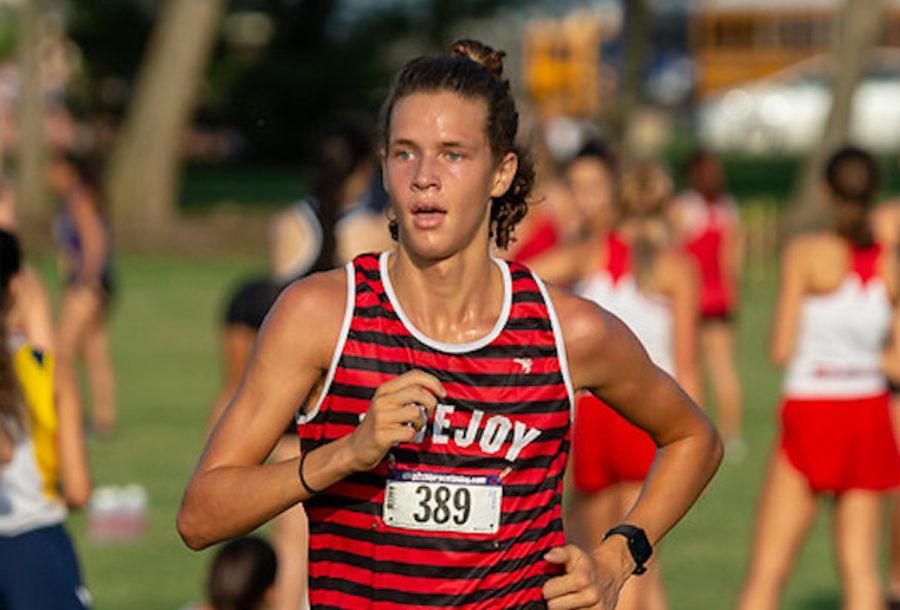 Junior Will Muirhead keeps a steady pace at the Plano ISD Invitational.