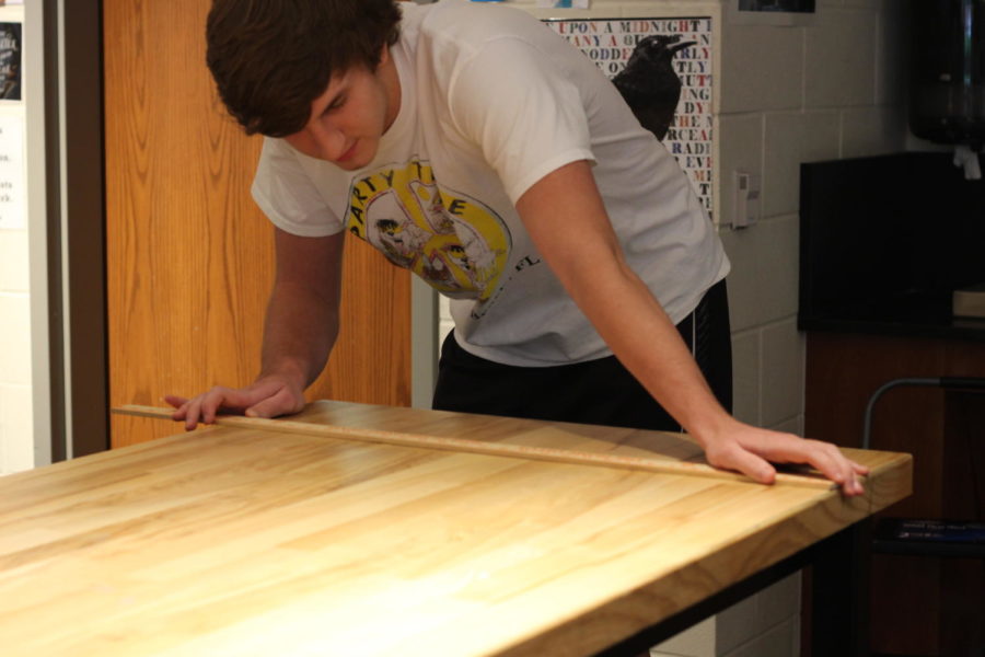 Seniors Luke Ledebur and JD Davidson spent their summer building desks and chairs for school districts across the metroplex.