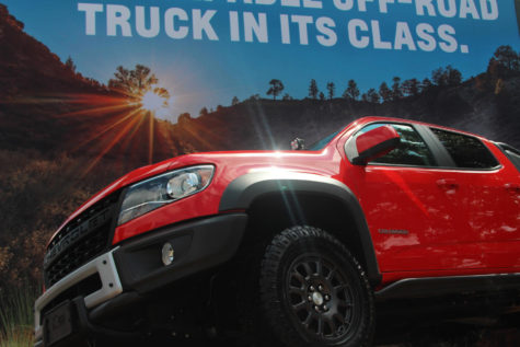 Located outside the Automobile building, the Truck Zone is an outdoor space featuring car models including Chevrolet.
