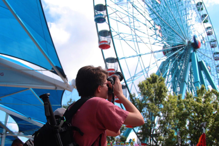 Junior Kelsey Carroll rides the Ferris wheel for the first time at the State Fair of Texas, despite long-time fears.