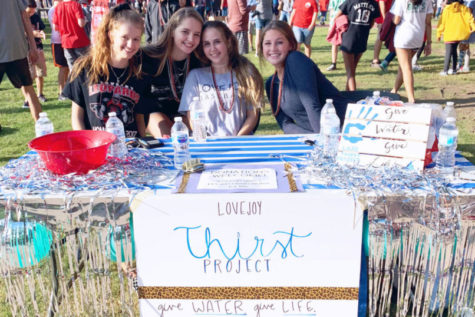 (from left to right) Haley Mise, Addison Hand, Amy Cummings, and Emma Wenaas run the Thirst project club on Leopard Friday.