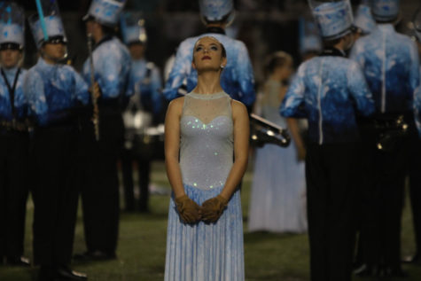 Freshman Joeley Hedgcoxe prepares to perform the show Silent Night. The band will compete in their second competition Saturday, October 13.