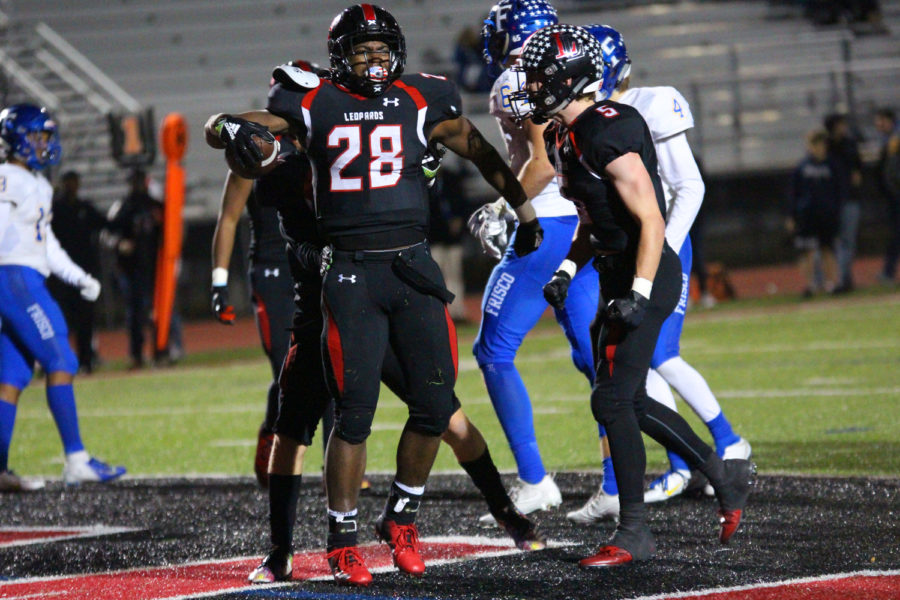 Jahi Rainey celebrates after a touchdown against Frisco.