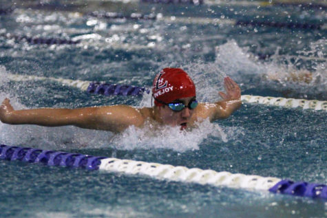 Freshman Andrew James swims the butterfly in the 200 individual medley at the Dallas Cup in Plano on Friday, Nov. 9.