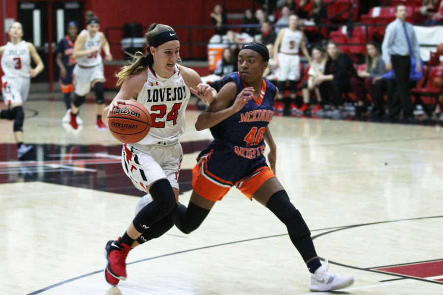 Junior guard Carsen McFadden drives to the rim on a fast break.