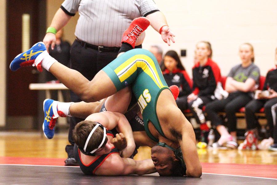 Sophomore Jacob Underwood wrestles in the CenTex tournament, which he finished in first place. 