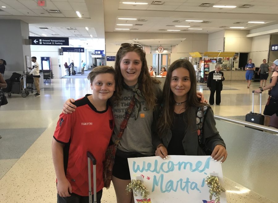 Spanish+exchange+student+Marta+Moreno+Gil+unites+with+her+host+family+at+the+airport.