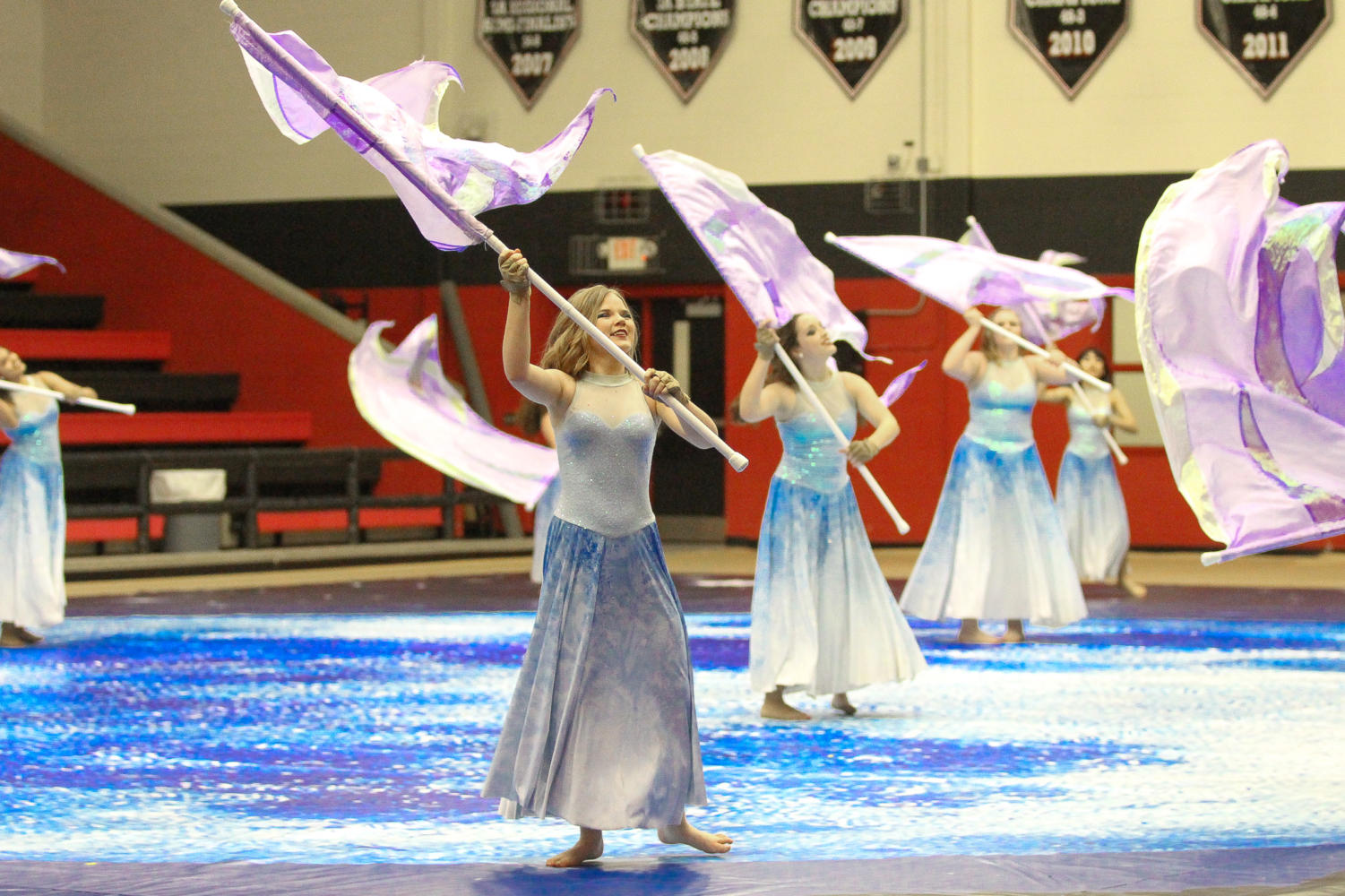 Color guard adds 'visual attribute' to marching band – The Red Ledger