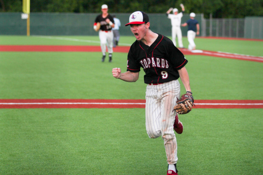 Senior Jake Terwilliger celebrates as the Leopards tie the game 7-7 in the seventh inning. 