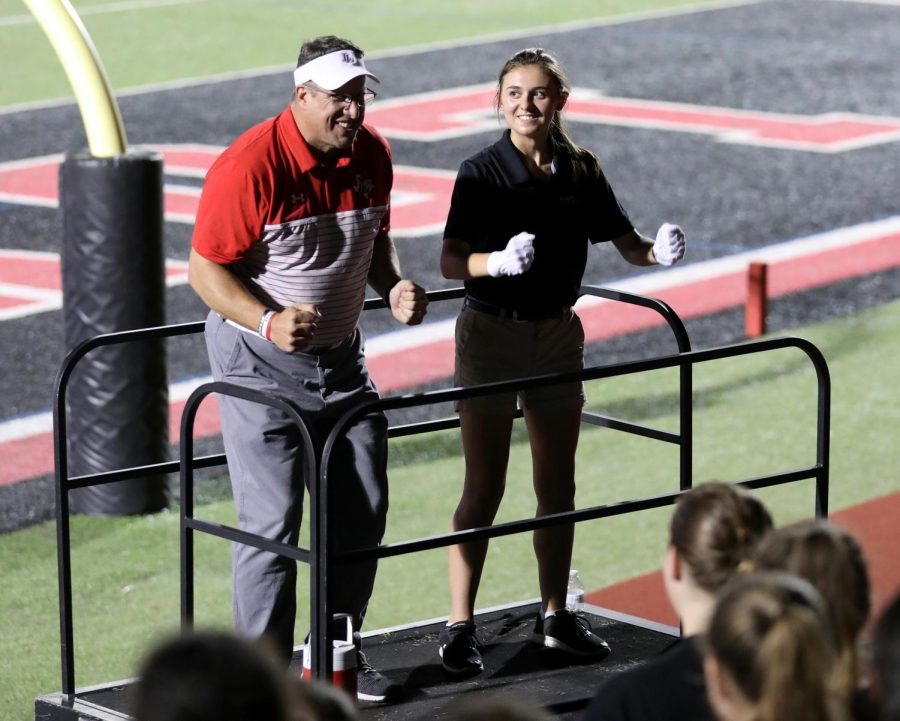 While attending the first home football game, Goddard visited the band directors and students. With senior Lily Hager, he led the band in a game called the roller coaster.