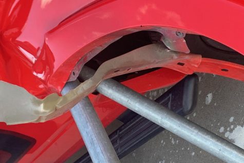 Campus parking lot gates puncture student’s truck