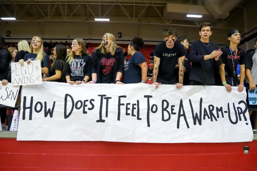 The senior class packed the stands with signs and posters including a banner for the freshman game saying, How does it feel to be a warm-up?
