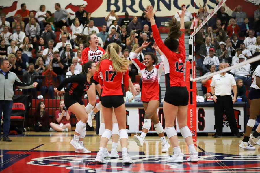 The Leopards celebrate on the court after a 25-22 third set win against Frisco Centennial. The Leopards will move onto area on Thursday, Nov. 7.