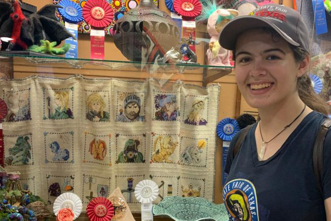 Senior Sophia Foster visits her sculpture at the State Fair of Texas. Foster had previously been awarded an honorable mention. 