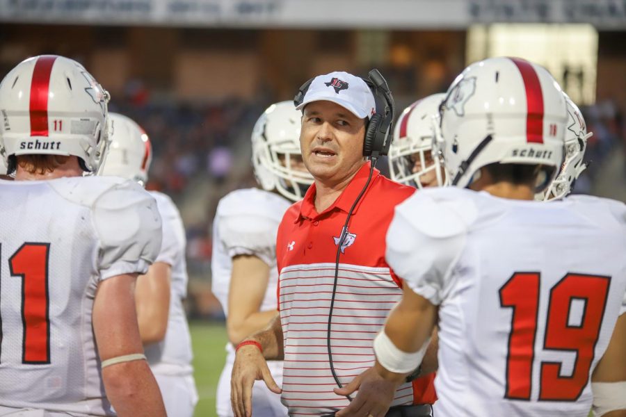 Head+football+coach+Todd+Ford+talks+to+his+offensive+players+during+the+2019+Tom+Landry+Classic+where+the+Leopards+fell+to+the+Colleyville+Heritage+panthers+13-10.