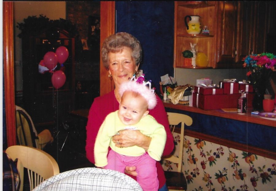 Wanda Elmore holds sophomore Carlee George at her first birthday party. 