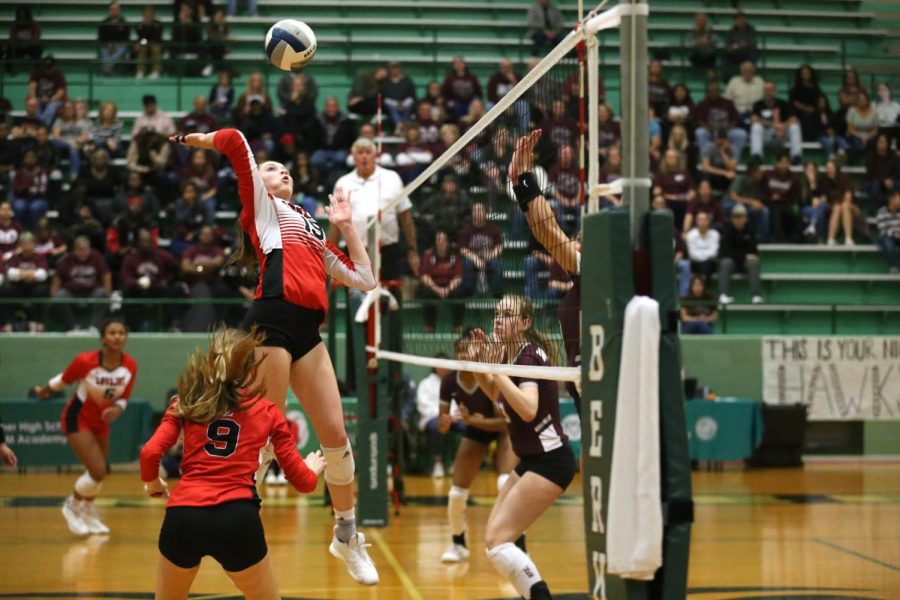 Senior Lexie Collins hits the ball at the regional semi-final playoff game of the 2020 season. Collins is committed to play volleyball for the University of Wyoming.