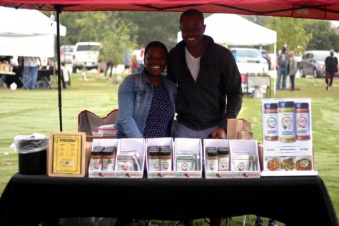 Abena and Eugene Foli stand behind their spices at their booth at the Lucas Farmers Market. The couple sell spices based out of Ghana West Africa that she has created. 