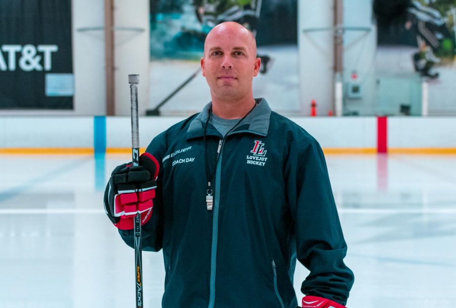 Coach Jason Day holds a stick on the ice. The hockey team practices at the Starcenter in McKinney. 