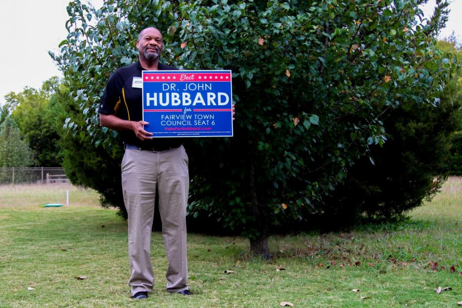 Dr. John Hubbard holds his campaign sign. Hubbard is running against Roland Feldman for Seat 6 of Fairview Town Council. 