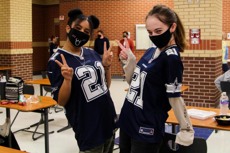 Sophomore Katy and Gillian Nuckels twin in their Dallas Cowboys jersey. Many Cowboys jerseys were worn for this dress up day. 