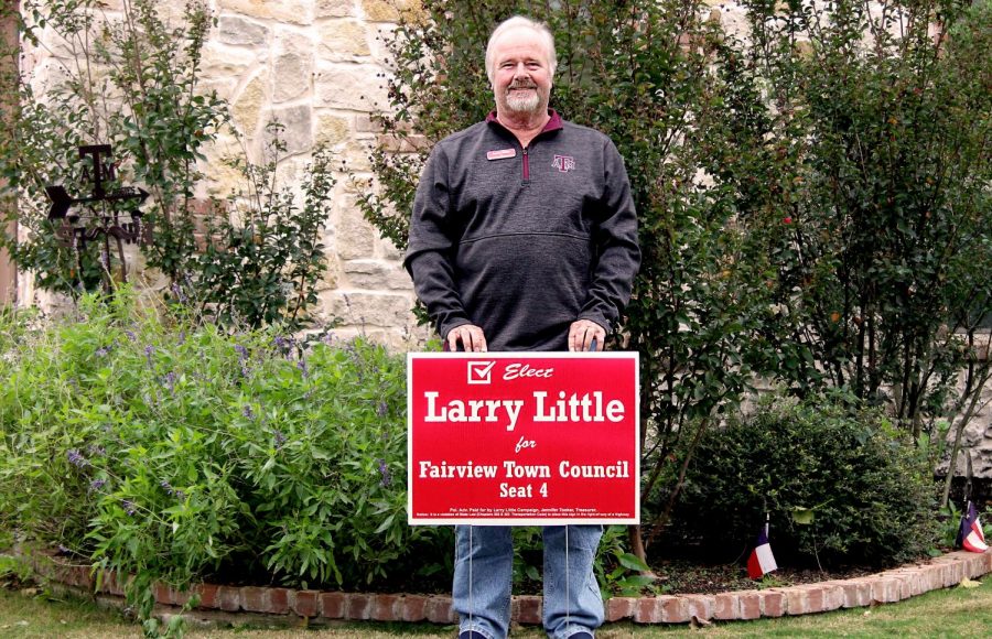 Larry Little stands behind his campaign sign for the Fairview Town Council election. His wife, Pam Little, was a previous town council member. 