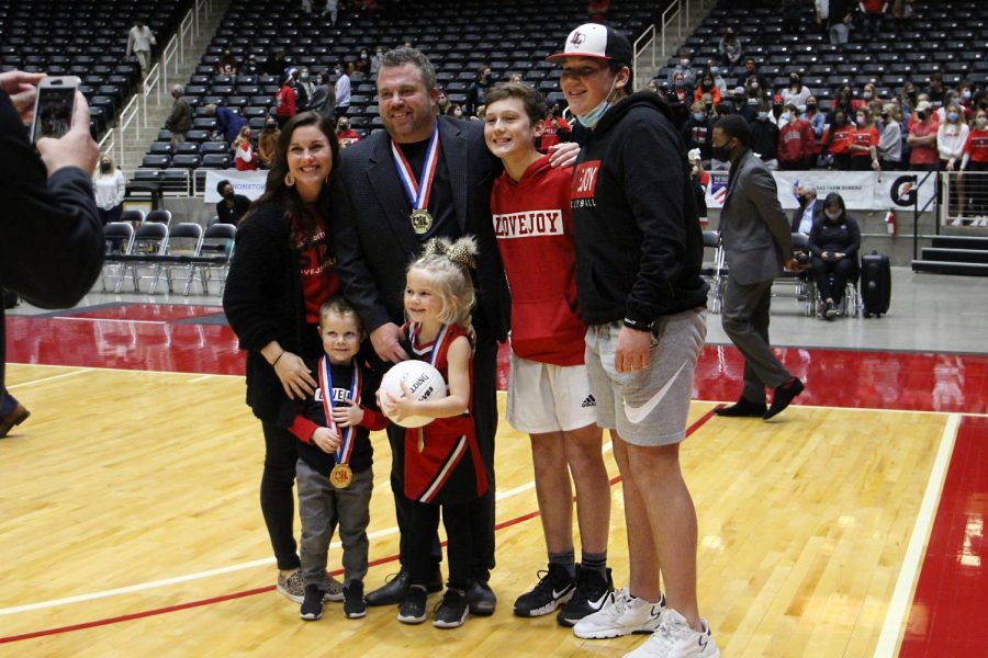 Ryan Mitchell celebrates with his family after winning the state championship. Mitchell was awarded a 2020 AVCA high school region coaches of the year award.