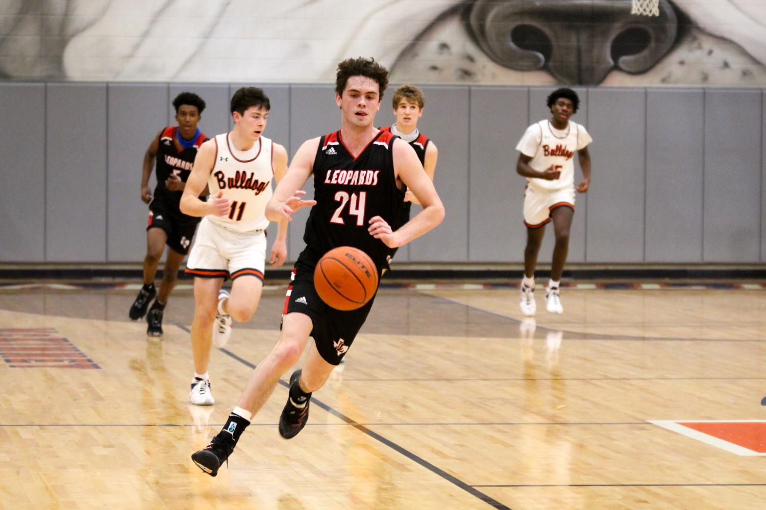 Photo Gallery: Basketball beats McKinney North 41-29 – The Red Ledger