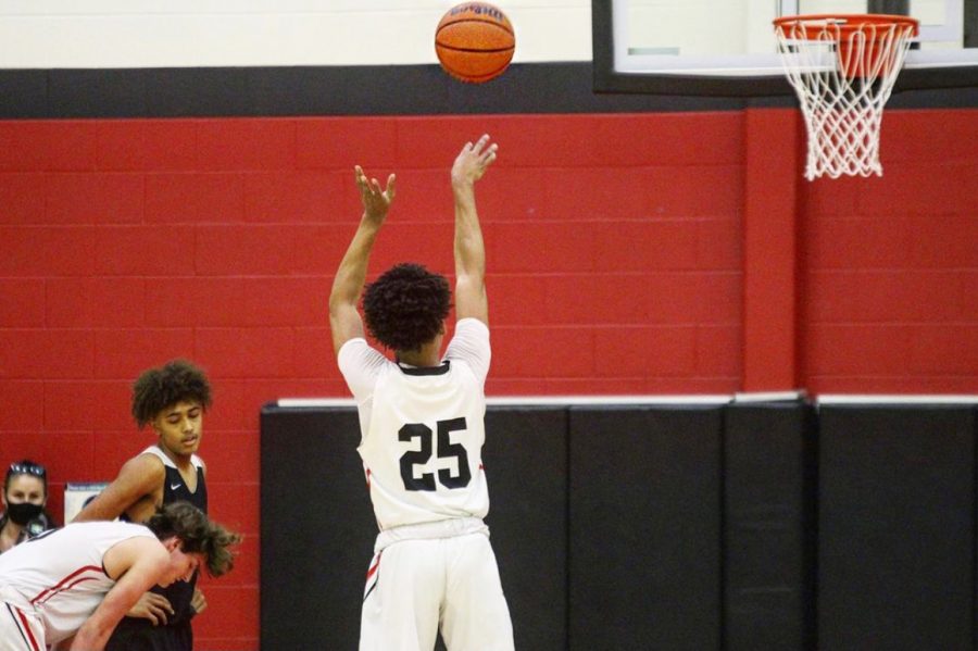 Junior Jayden Lawton plays on the junior varsity basketball team. He has played basketball for five years. 