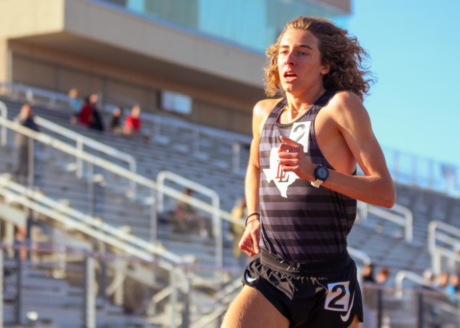 Junior Tate Barr runs in the 1600-meter race in the 2021 Lovejoy Invitational Meet. Barr won the race with a time of 4:29.57. 