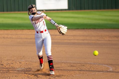 Sophomore pitcher no. 7 Jade Owens pitches the ball to a Raider hitter. Owens pitched the first five innings of the game. 