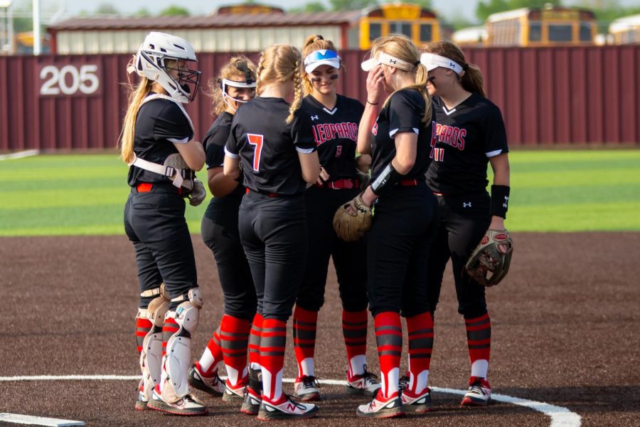 Sophomore+catcher+no.+3+Sydney+Bardwell%2C+junior+third+basemen+no.+16+Emma+Bittlestone%2C+sophomore+pitcher+no.+7+Jade+Owens%2C+freshmen+short+stop+no.+5+Skylar+Rucker%2C+senior+first+basemen+no.+4+Holly+Massey%2C+and+sophomore+second+basemen+no.+11+Hannah+Harvey+stand+together+before+the+start+of+the+second+inning.+The+Leopards+will+play+Frisco+Wakeland+tonight+and+tomorrow+for+the+first+round+of+playoffs.+