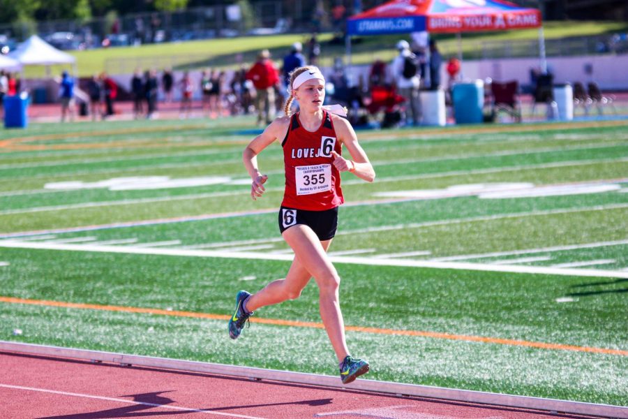 Freshman runner Kailey Littlefield wears bib six as she takes a steadfast lead in the 800 meter race. Littlefield ran the race 2:10:76 crowning her first place and qualifying for state.